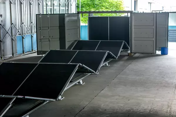 Folded solar panels in solar container
